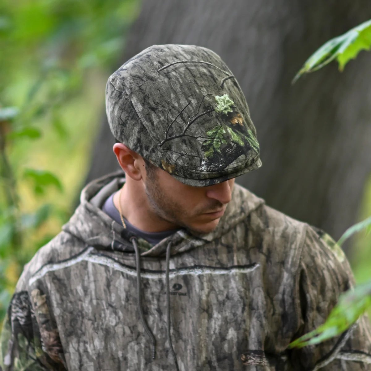 🦌 Där tradition möter livlighet — Mossy Oak x Boston Scally Cap 🧢